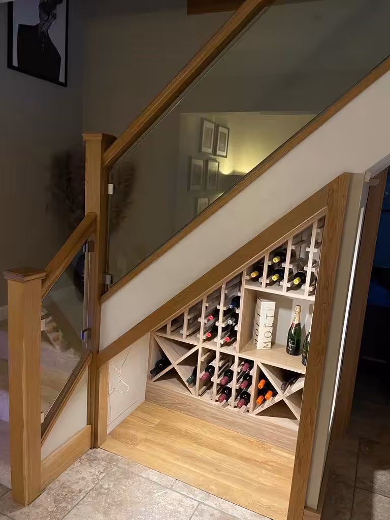 Bespoke Joinery, Emerging Trends For 2025 1 bespoke joinery by sussex based company one stop joinery creating this under stair wine rack